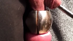 Dilation urethra and balls to hand the same time