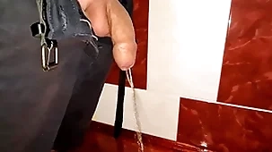 Small uncut cock pissing