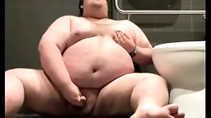 Chubby plays in public bathroom