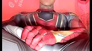 Jakipz strokes his mammoth cock in super hero costumes before shooting a huge load