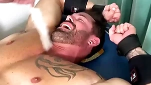 Muscular hunk endures bondage and torment on half starkers horde