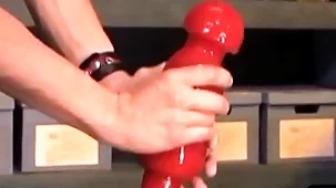 Strange bdsm stud takes massive dildo
