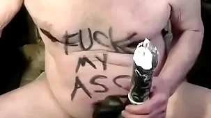 Tonyslave training his male hole with dildo